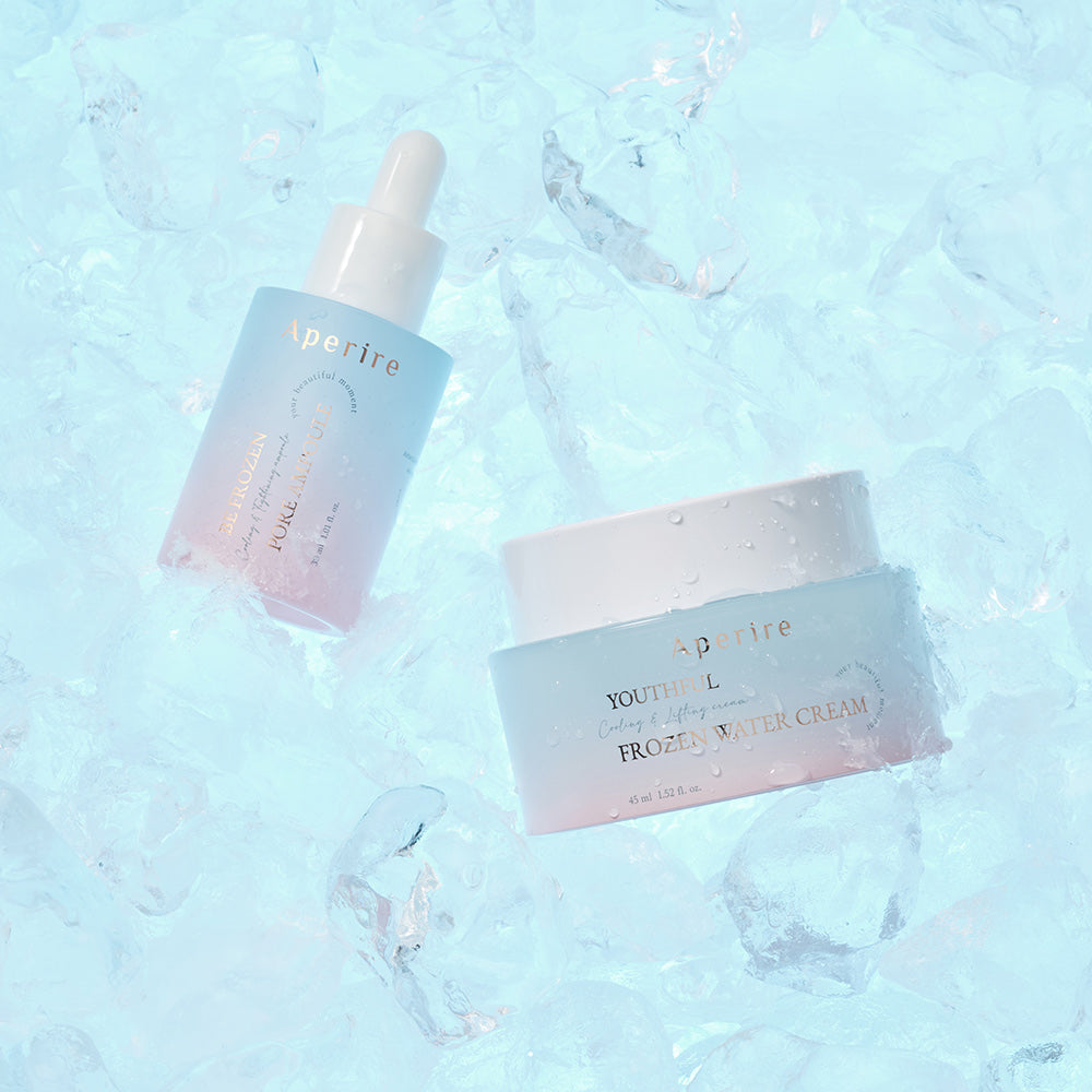 Aperire Frozen Pore Mask serum and Youthful Frozen Water Cream on ice cubes for cooling skincare