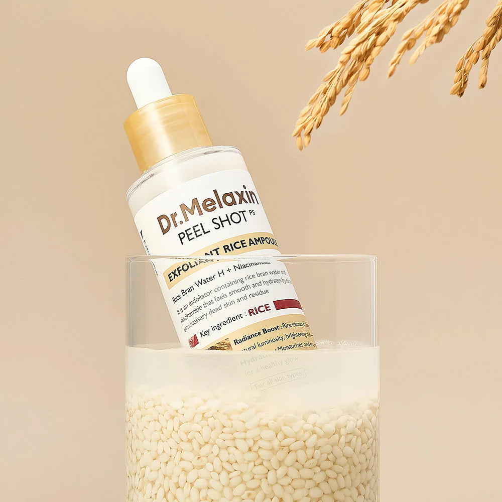 Dr. Melaxin Peel Shot rice-based exfoliating serum bottle in glass filled with rice grains and water